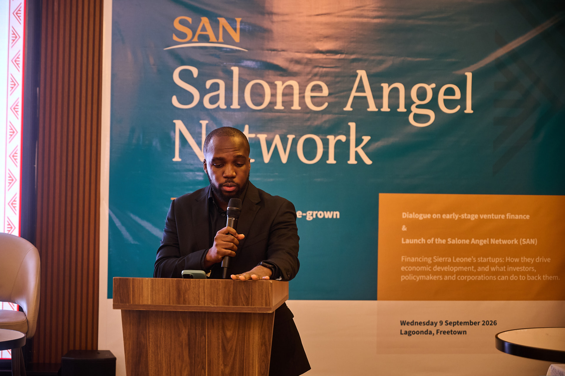 A speaker addressing guests at the Salone Angel Network launch in Freetown